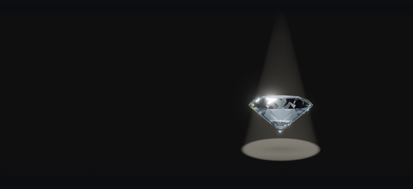 A faceted diamond fully illuminated by a spotlight